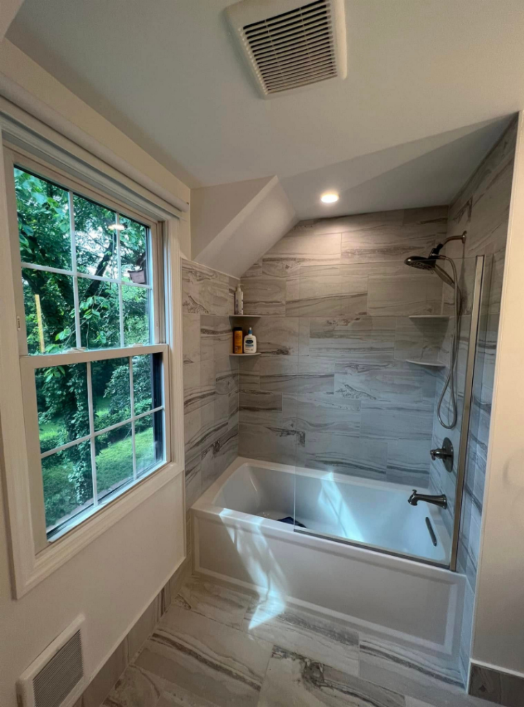 Bathtub and tile work with window view in Pittsburgh