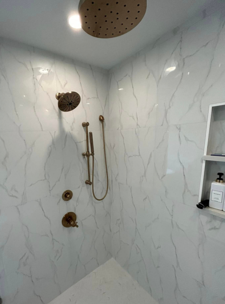 Marbled tile work in remodeled bathroom shower in Pittsburgh, PA